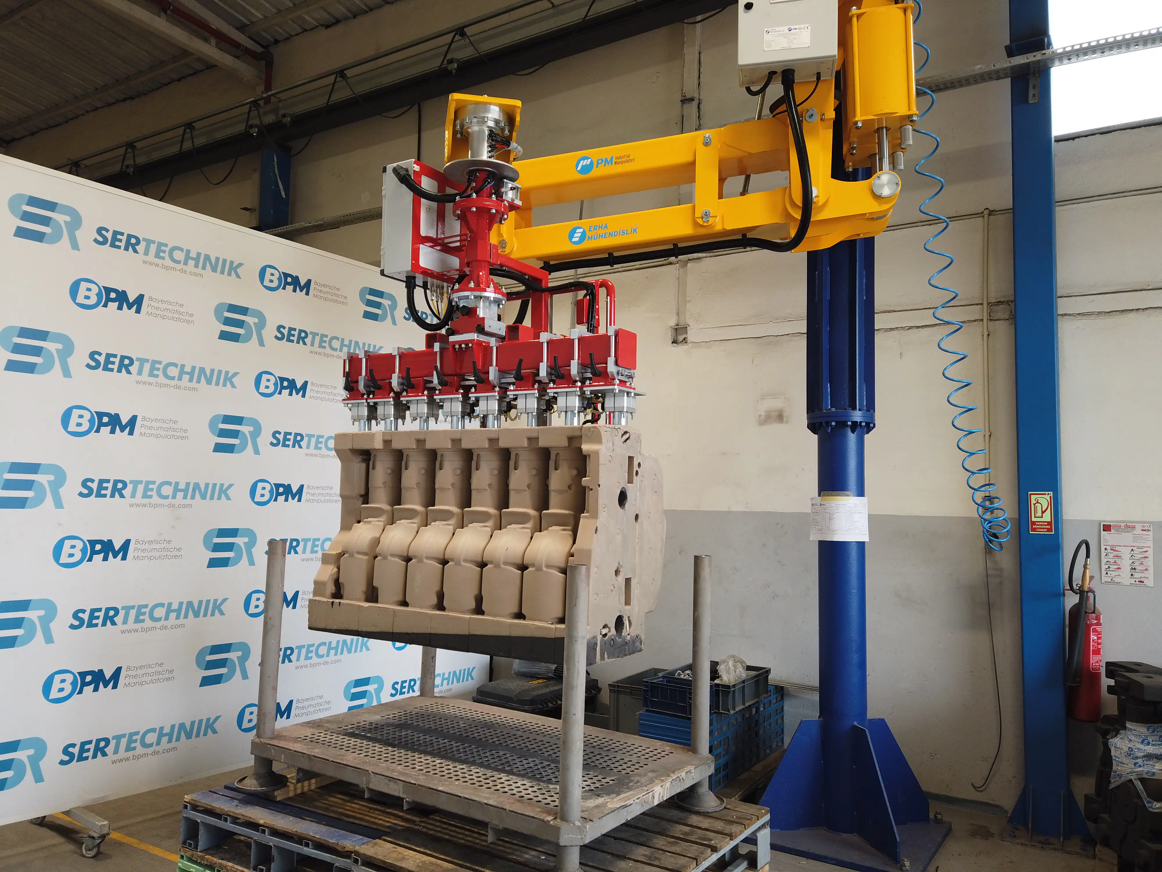 PM foundry core handling manipulator application